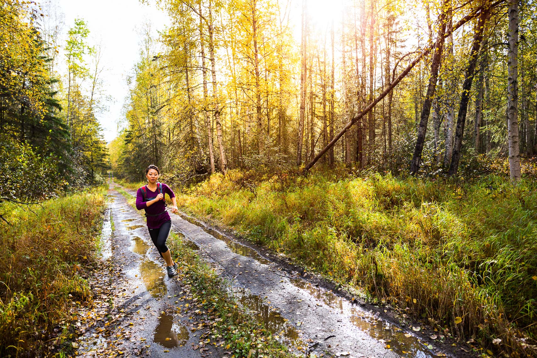 Asian Woman Trail Running in Alaska | Michael DeYoung