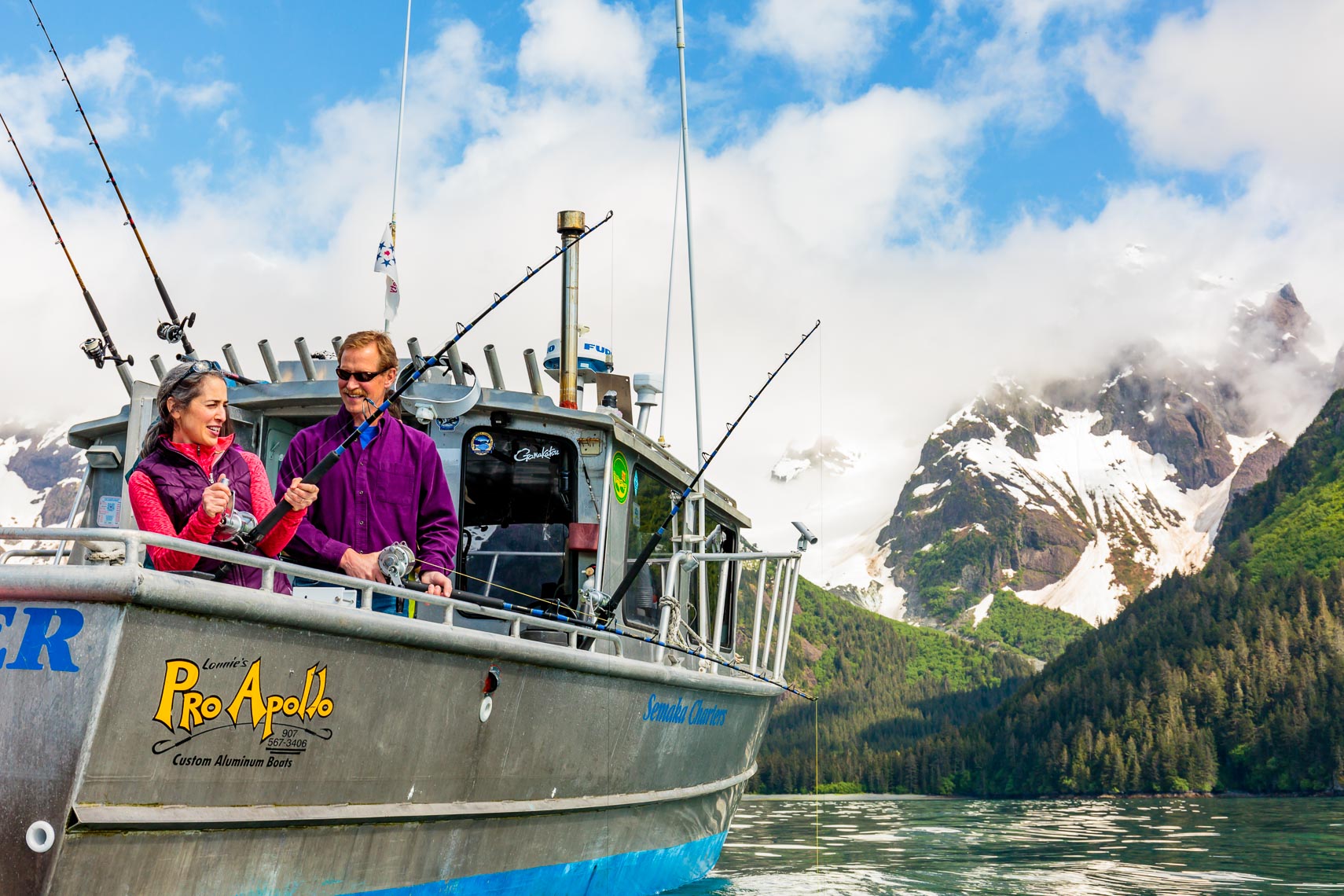 Visit Seward Couple Salmon Charter Boat | Michael DeYoung