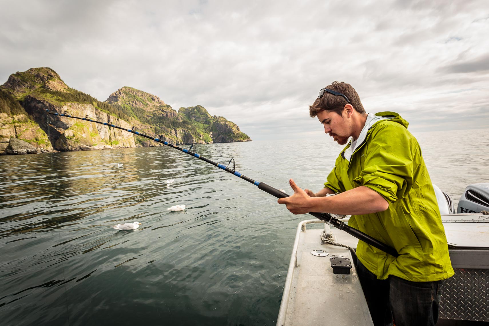 Visit Seward Alaska Man Fishing for Salmon | Michael DeYoung