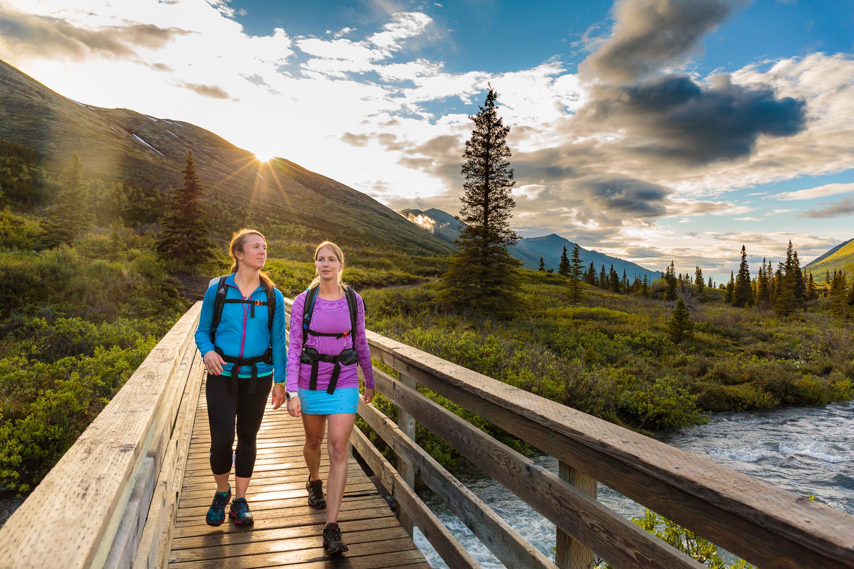 Hiking Friends on Bridge in Alaska | Michael DeYoung