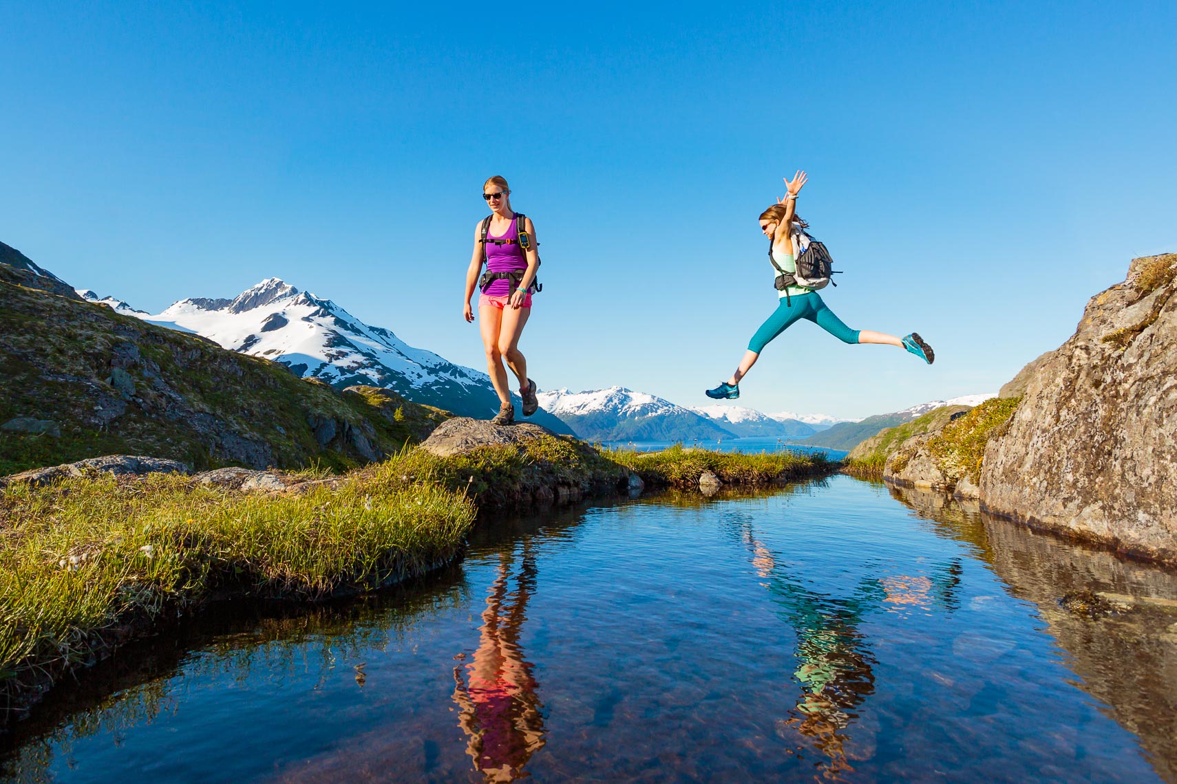 Alaska Hiker Leap Portage Pass | Michael DeYoung