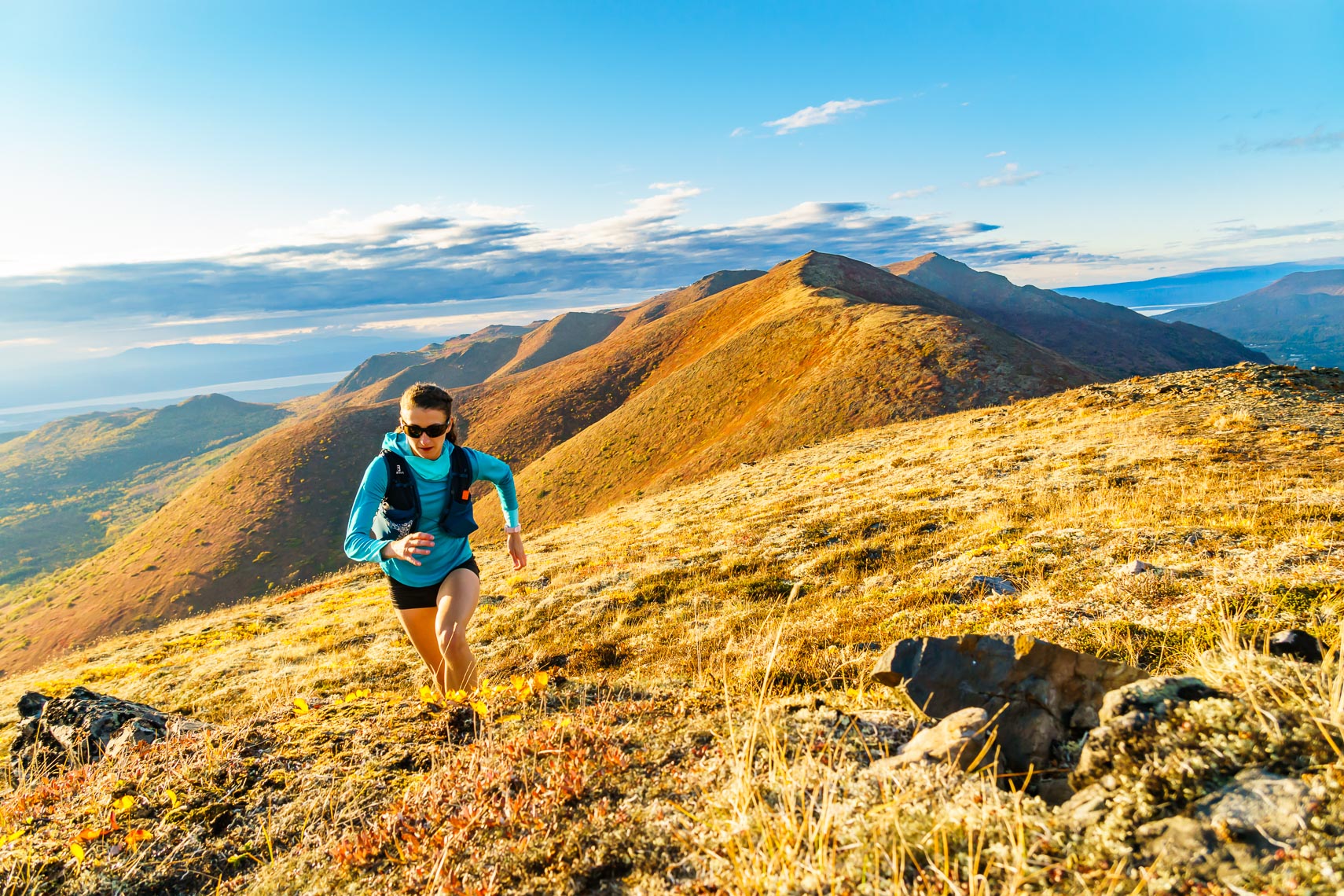 Woman Trail Runner Training in Alaska | Michael DeYoung