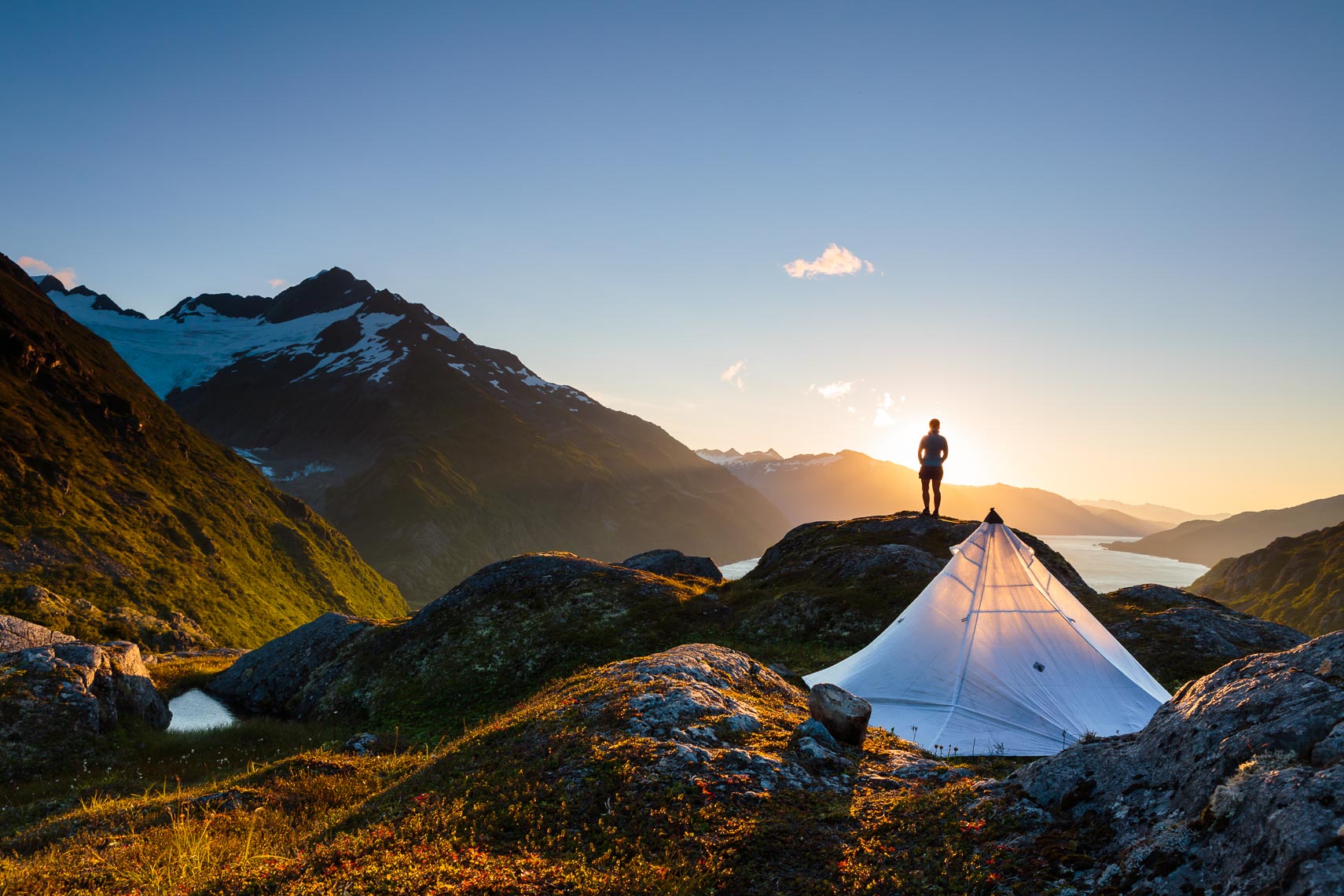 Alaska Travel Hiker At Remote Camp | Michael DeYoung