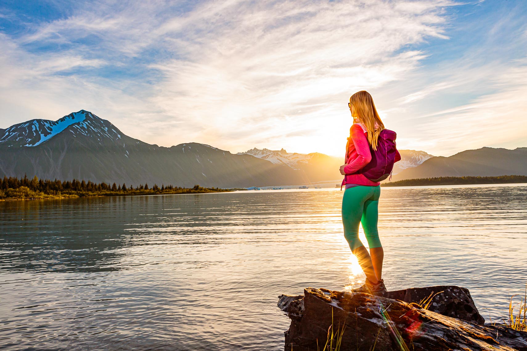 Alaska Travel Female Traveler Sunset View | Michael DeYoung