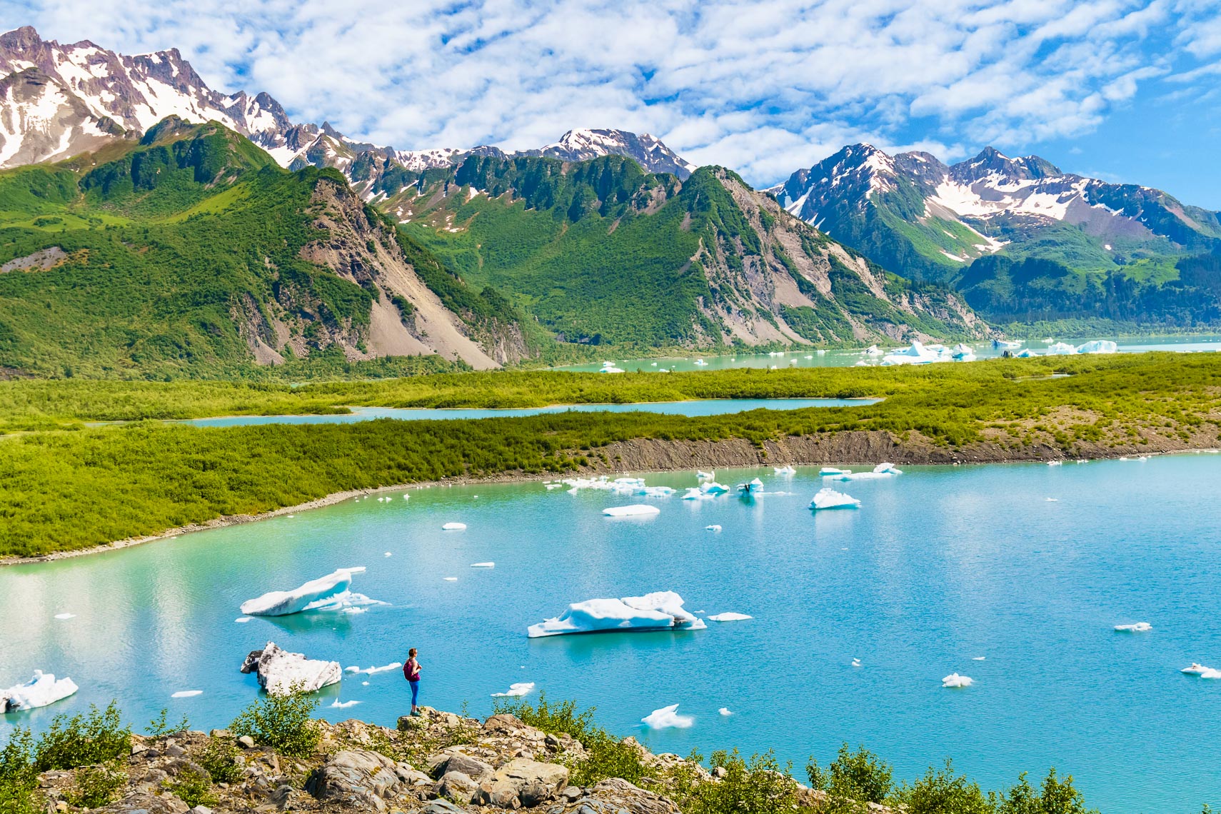 Hikers Overlooking Glacier Lake in Alaska | Michael DeYoung