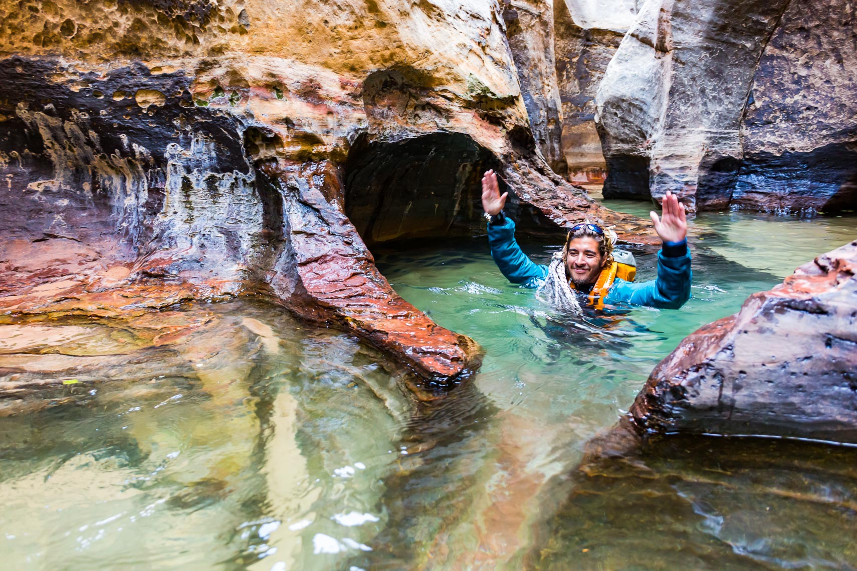 Hiker Wading Subway Zion National Park | Michael DeYoung