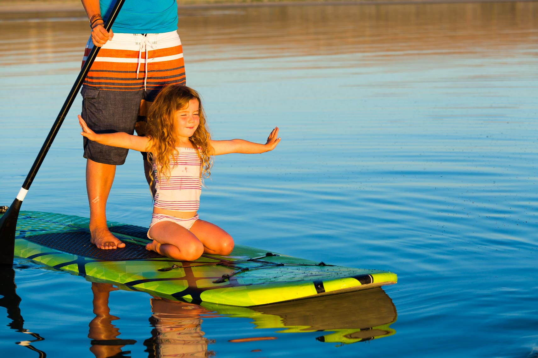 Young Girl on Paddle Board | Photographer Michael DeYoung