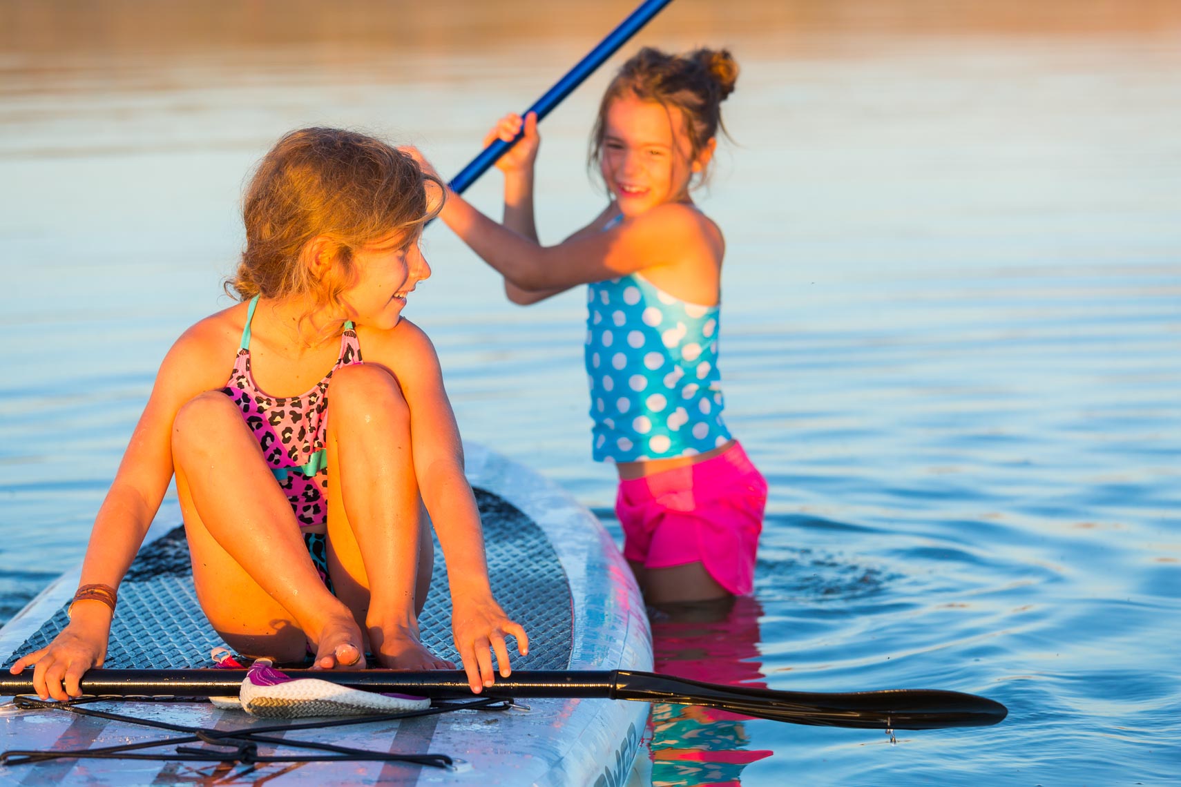 Young Friends Playing Paddle Boarding | Michael DeYoung