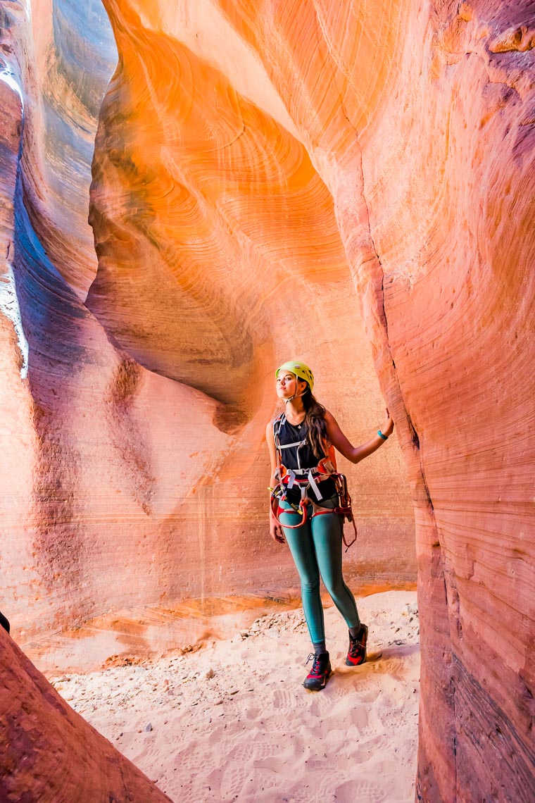 Woman Hikes Utah Slot Canyon | Photographer Michael DeYoung